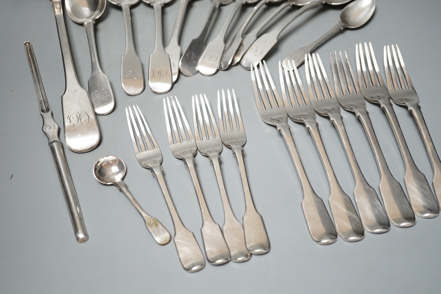 Twenty three items of continental white metal fiddle pattern flatware, stamped GH, including a soup ladle and marrow scoop